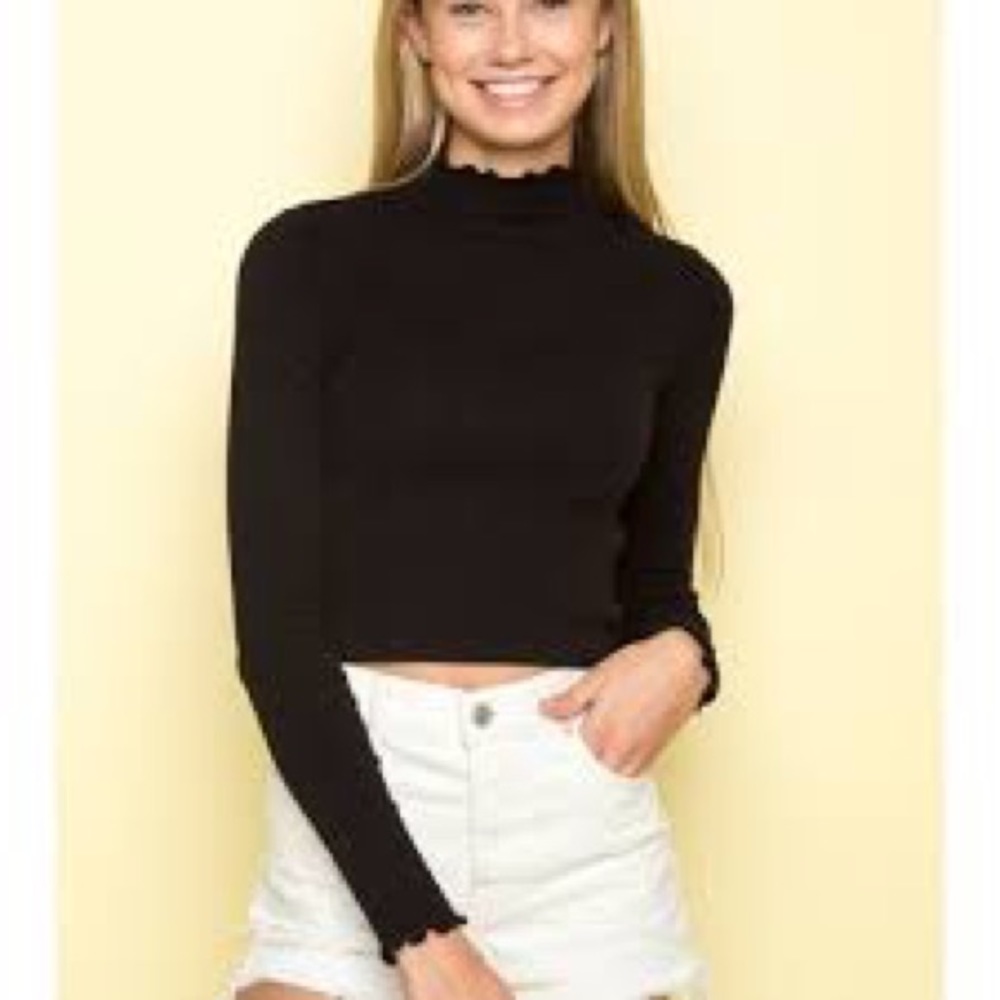 Brandy Melville black ruffle shelly top